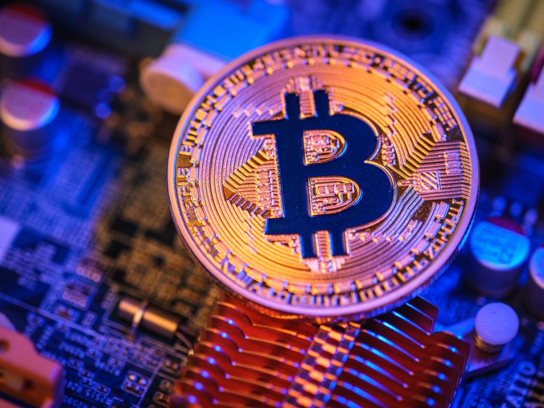 Bitcoin crypto currency on circuit board .virtual money.blockcha